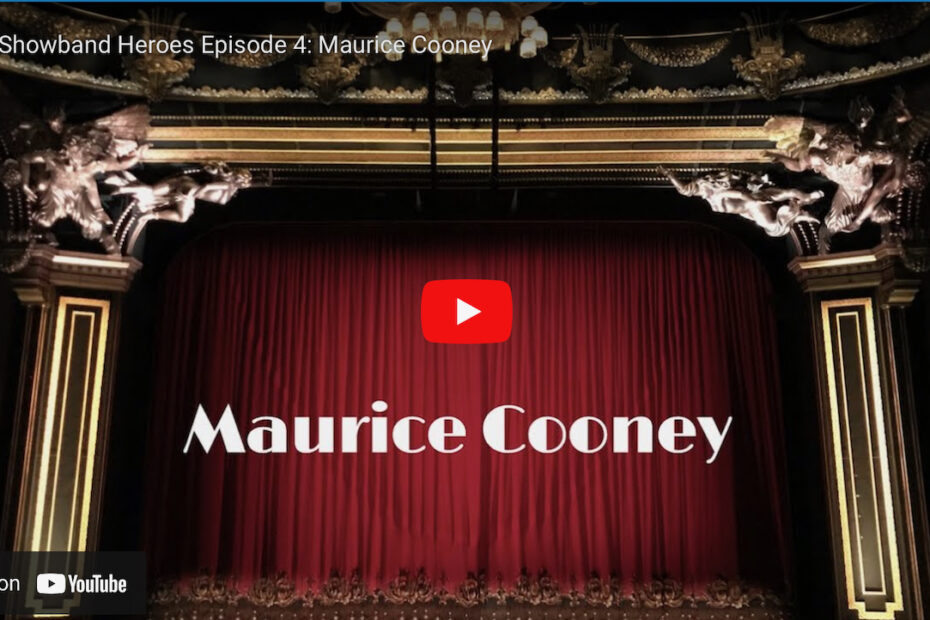 An image of red velvet curtains on an ornate stage with the text 'Maurice Cooney' and a YouTube play button superimposed