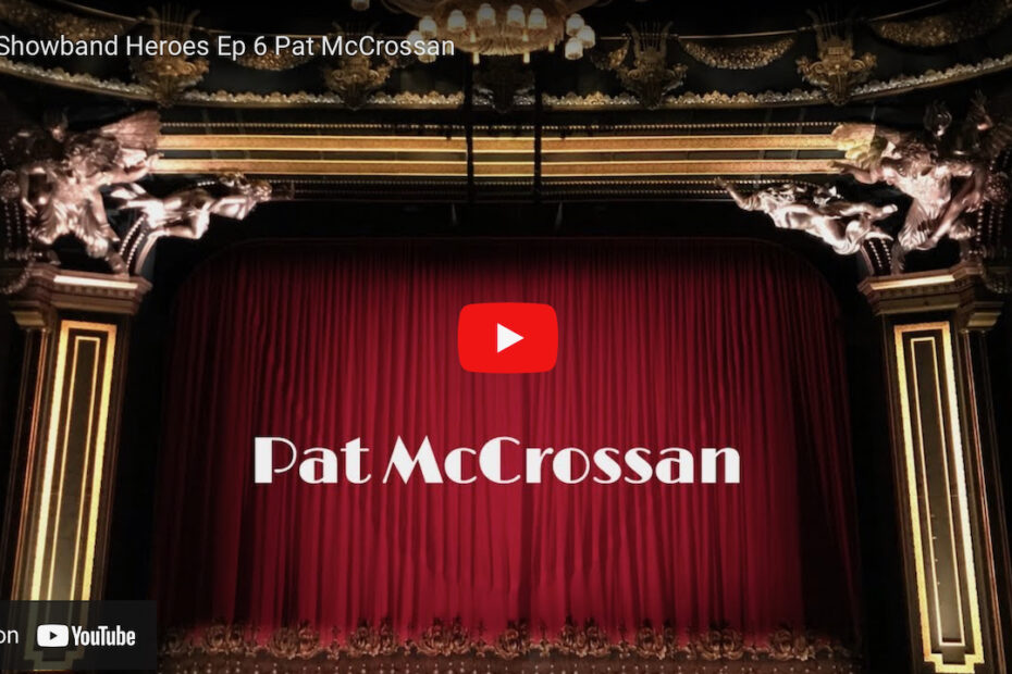 An image of red velvet curtains on an ornate stage with text 'Pat McCrossan' and a YouTube play button superimposed